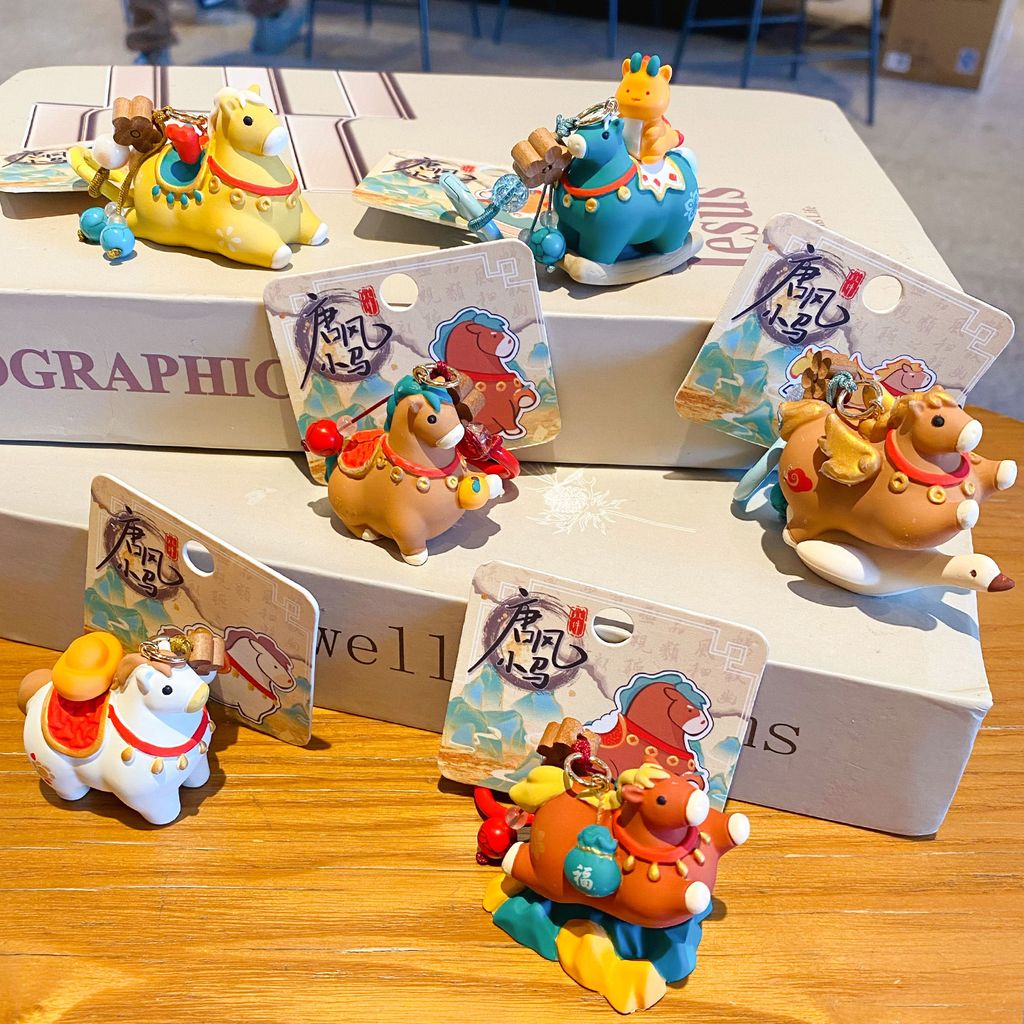 Tang-style lucky pony keychain charms featuring all six designs