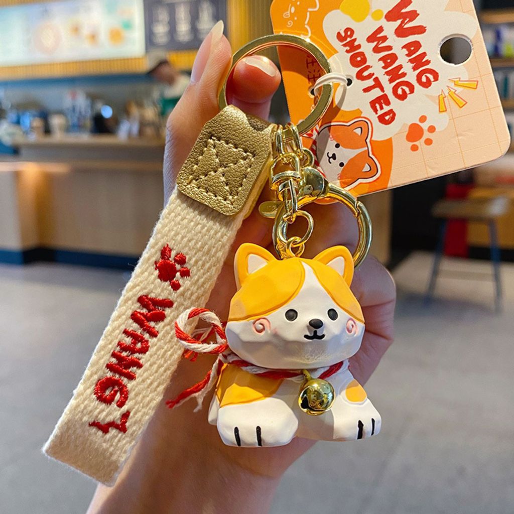 Corgi keychain charm in wood carving style