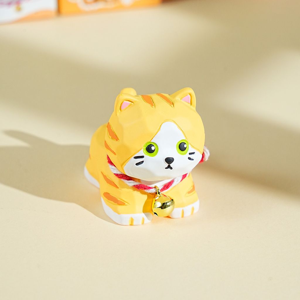 Orange tabby cat mini figurine in wood-carving style