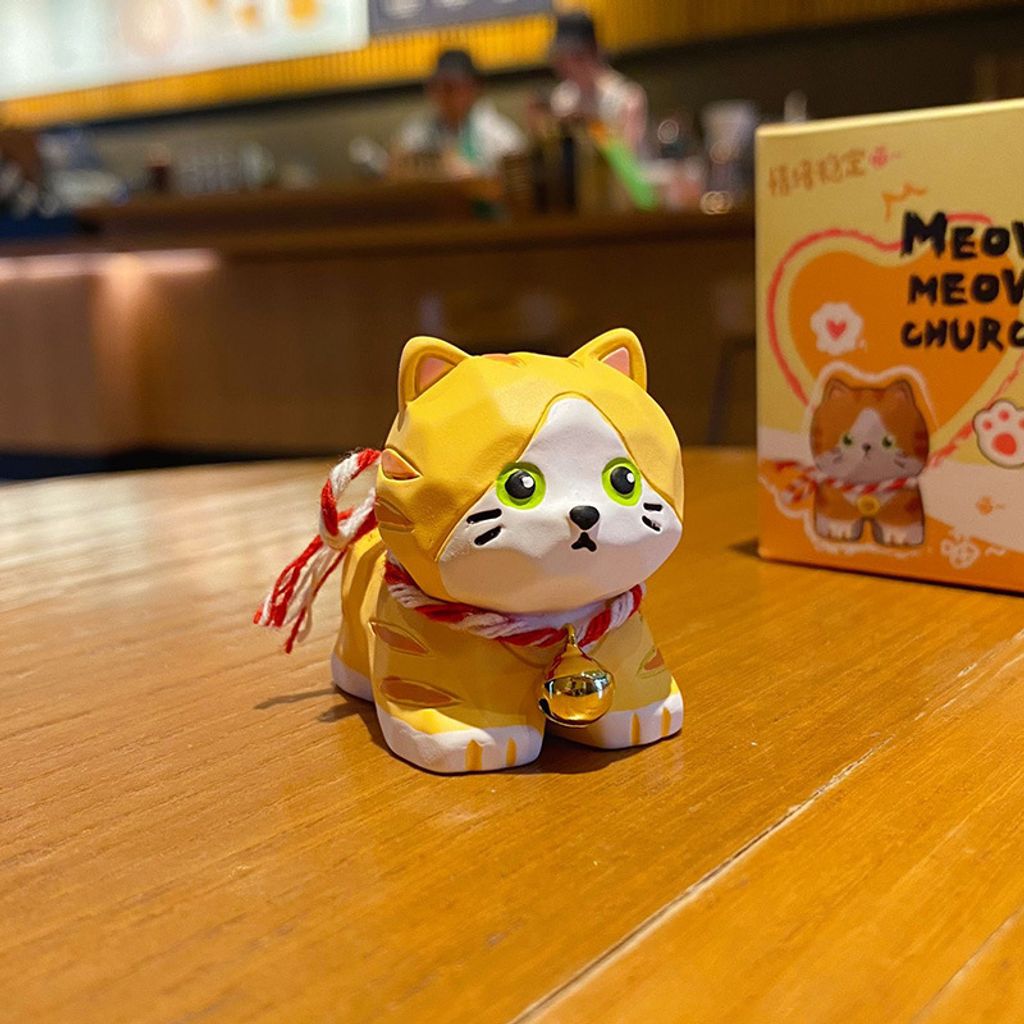 Orange tabby cat mini figurine in wood-carving style