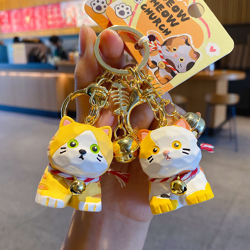 Orange tabby cat and calico cat keychain charms