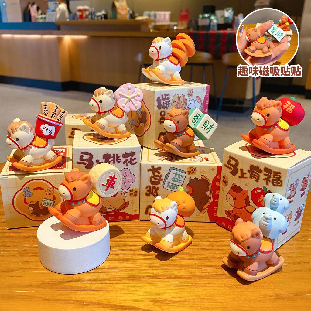 All eight designs of the wish-granting rocking horse mini figurines