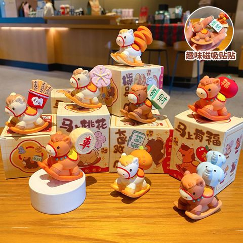 All eight designs of the wish-granting rocking horse mini figurines