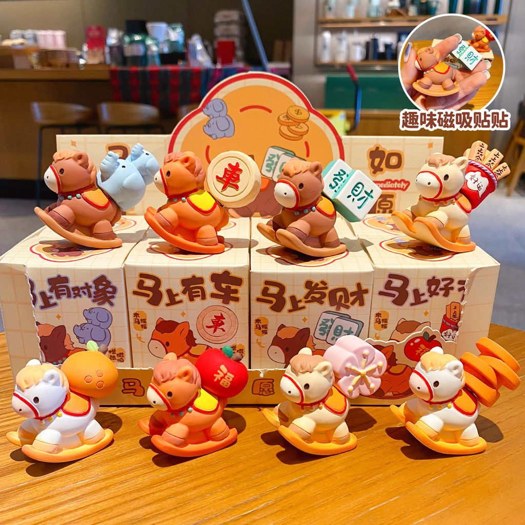 All eight designs of the wish-granting rocking horse mini figurines