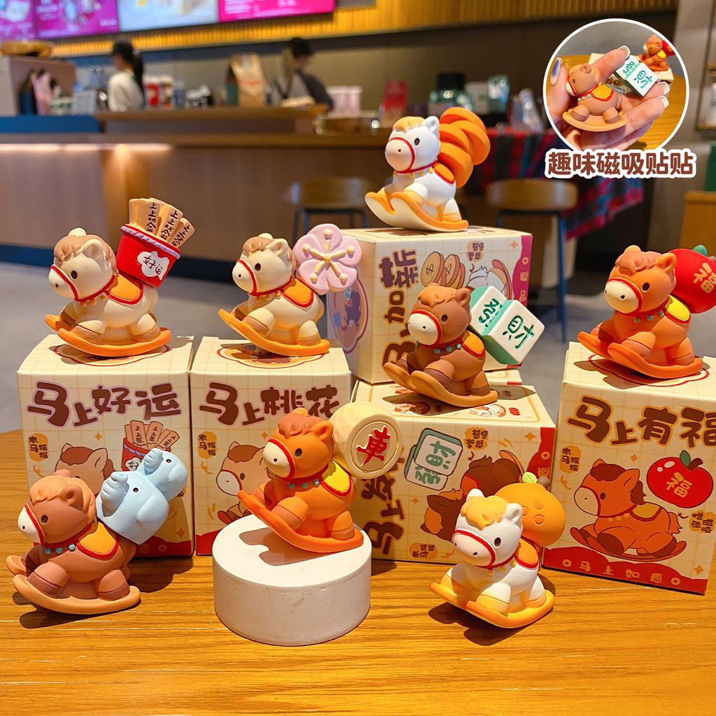 All eight designs of the wish-granting rocking horse mini figurines