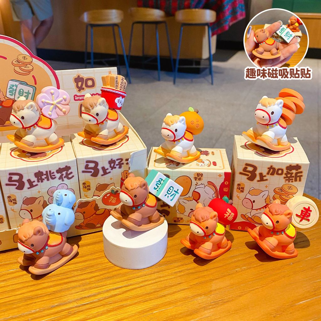 All eight designs of the wish-granting rocking horse mini figurines