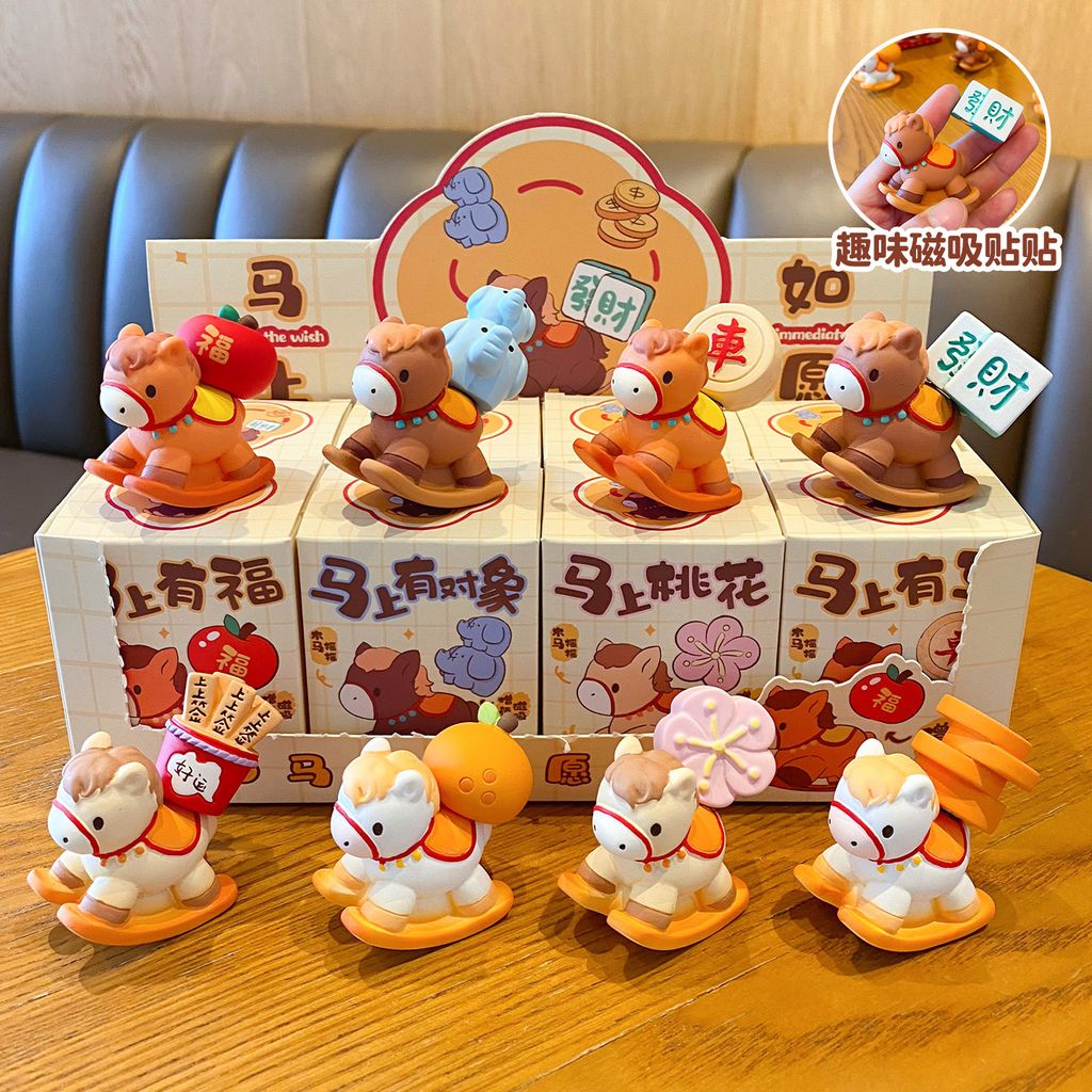 All eight designs of the wish-granting rocking horse mini figurines