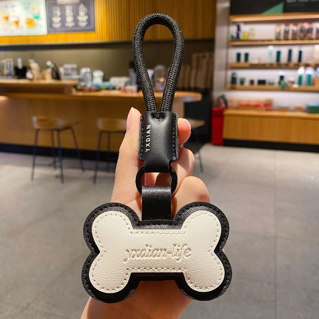 Cute bone leather keychain charm