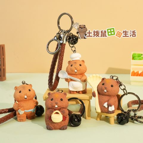Four groundhog country life keychain charms in gardener, harvester, woodcutter, and chef designs