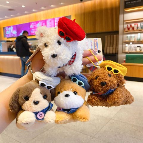 Kawaii puppy plush keychain charms featuring four dog designs