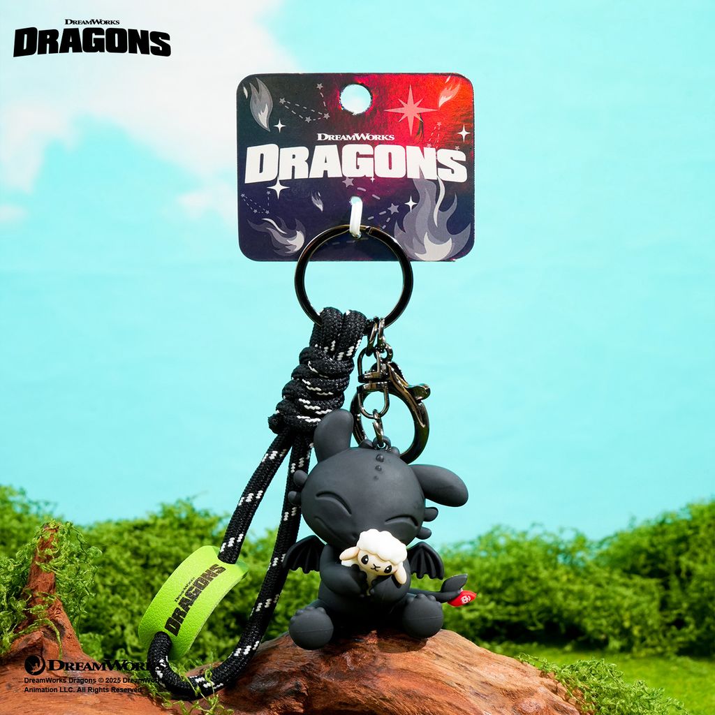 Toothless with sheep 3D keychain charm featuring Toothless holding a tiny sheep