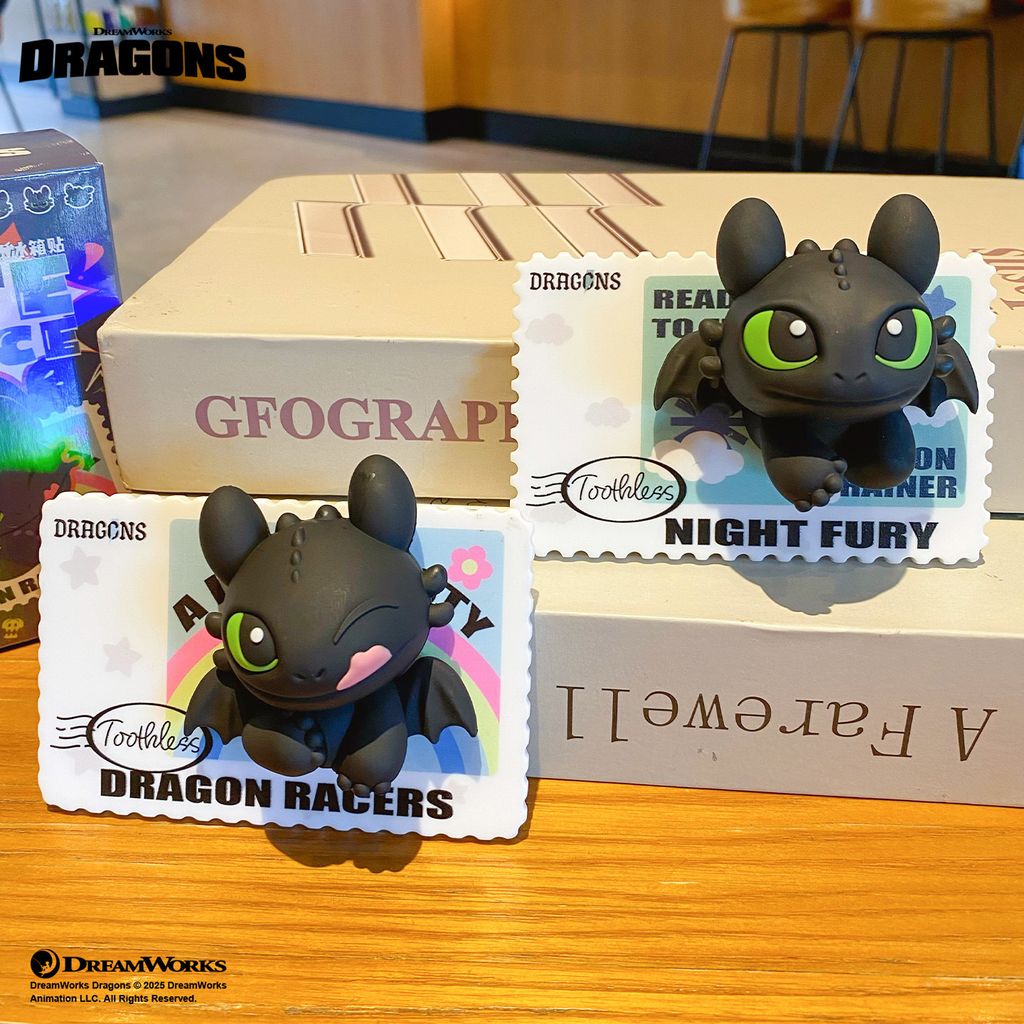 Toothless Wink and Toothless Smile semi-3D fridge magnets from How to Train Your Dragon