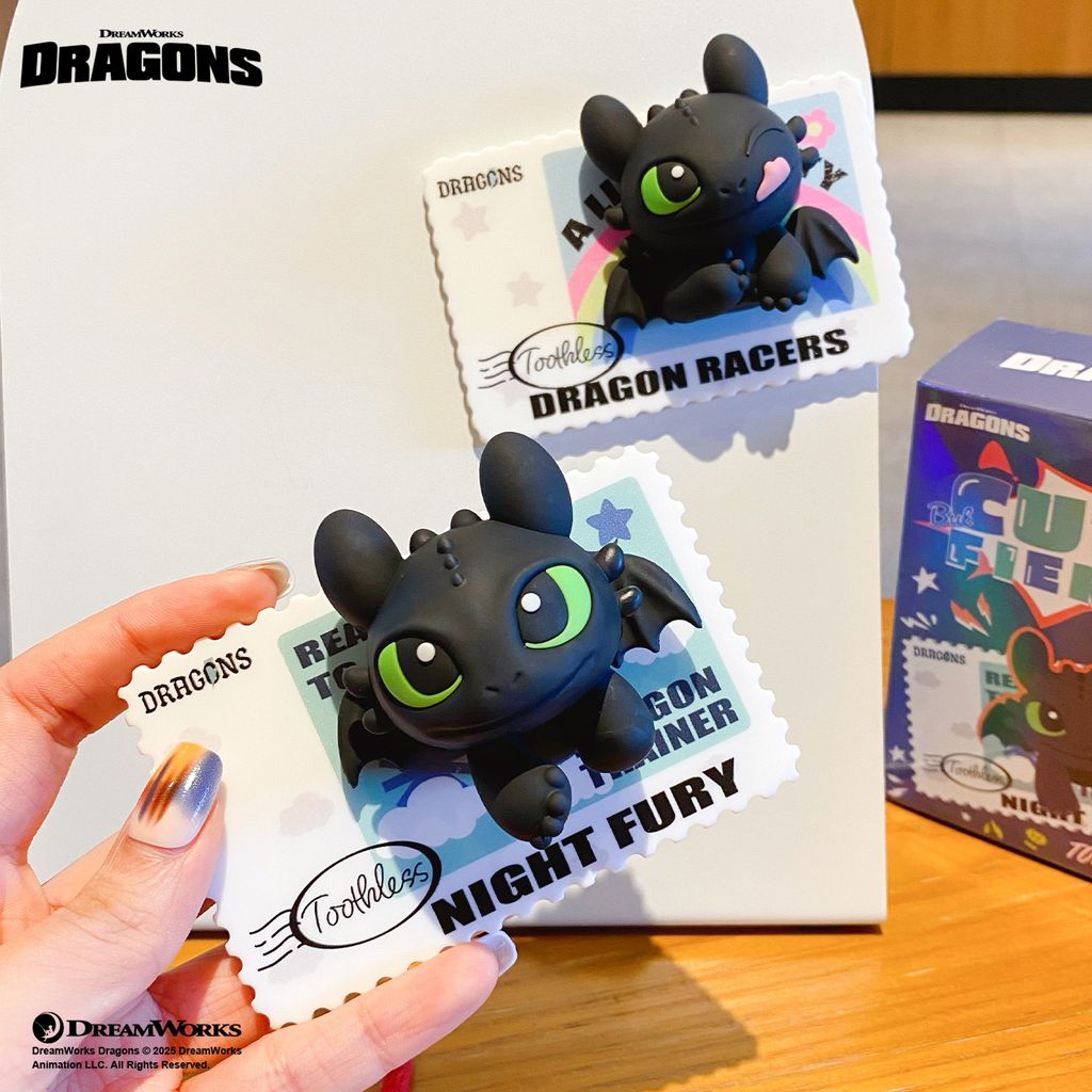Toothless Smile and Toothless Wink semi-3D fridge magnets from How to Train Your Dragon