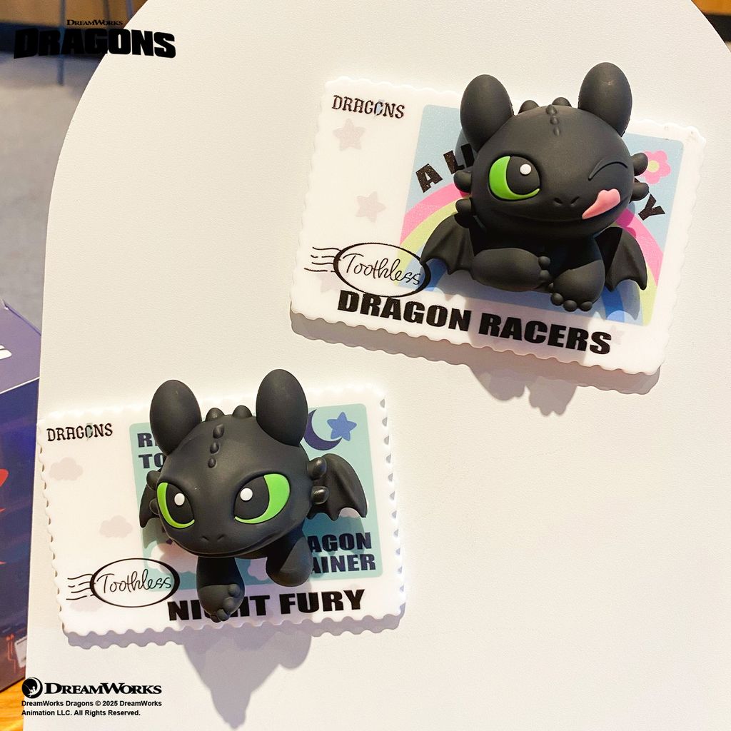 Toothless Smile and Toothless Wink semi-3D fridge magnets from How to Train Your Dragon