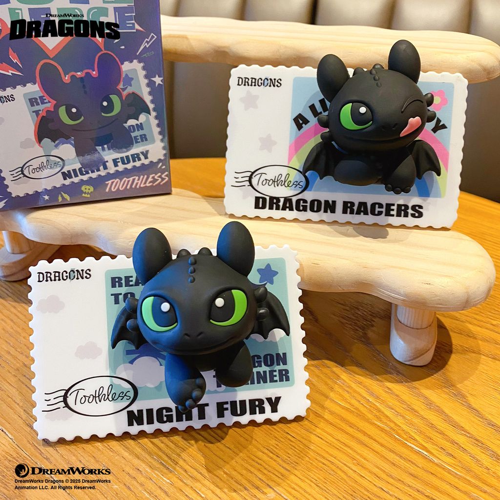 Toothless Smile and Toothless Wink semi-3D fridge magnets from How to Train Your Dragon