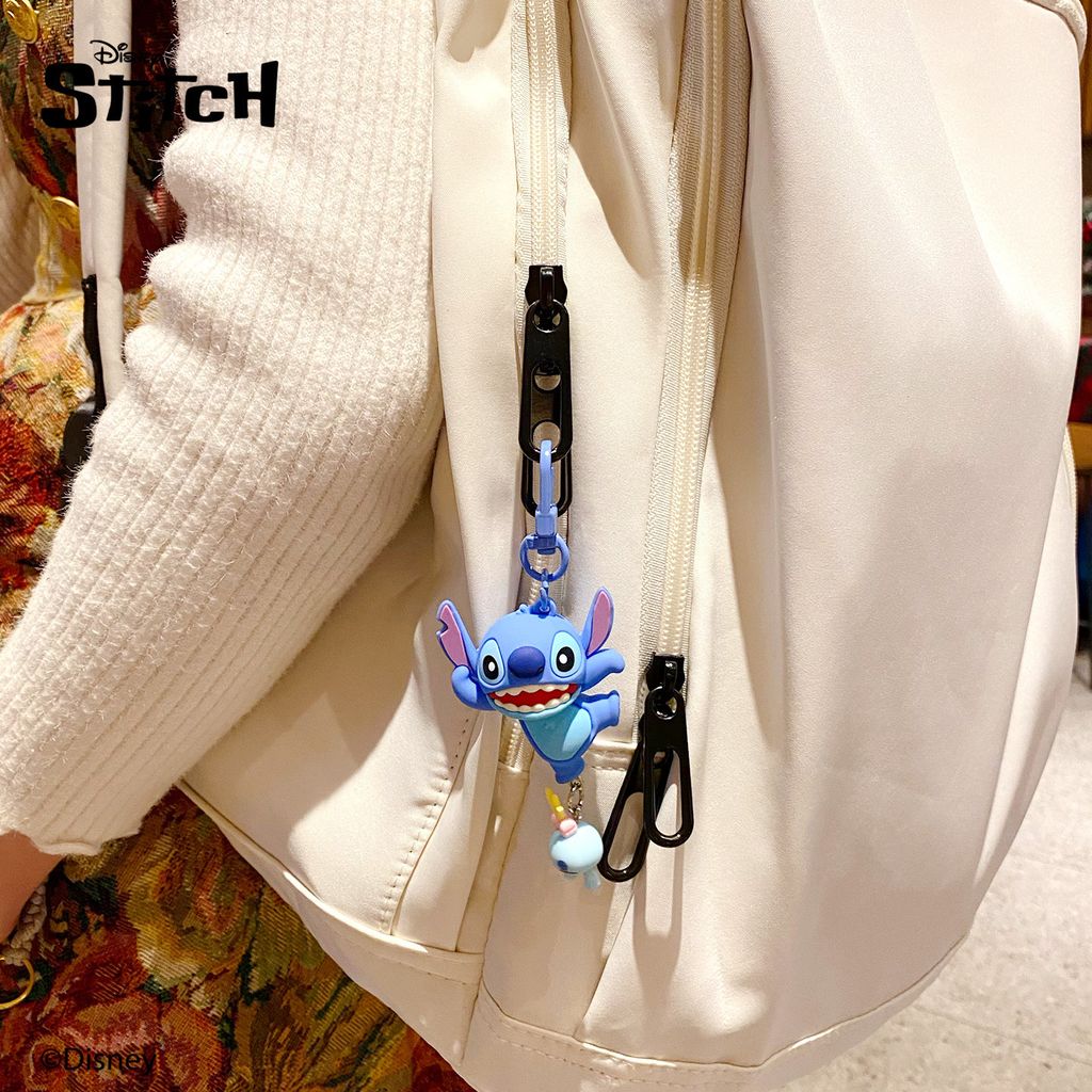Dancing Stitch keychain charm from the Stitch Playful Pals series hanging on a bag