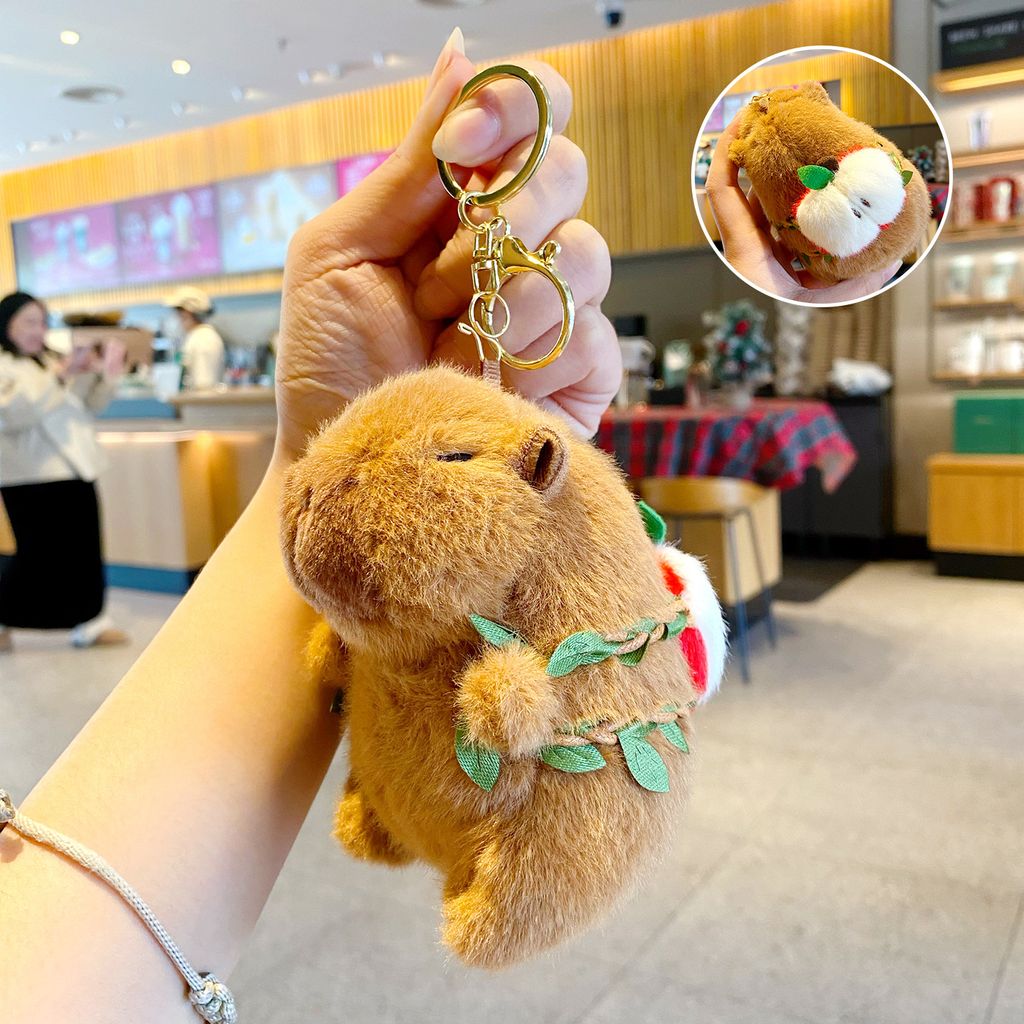 Cute capybara plush keychain with apple fruit backpack