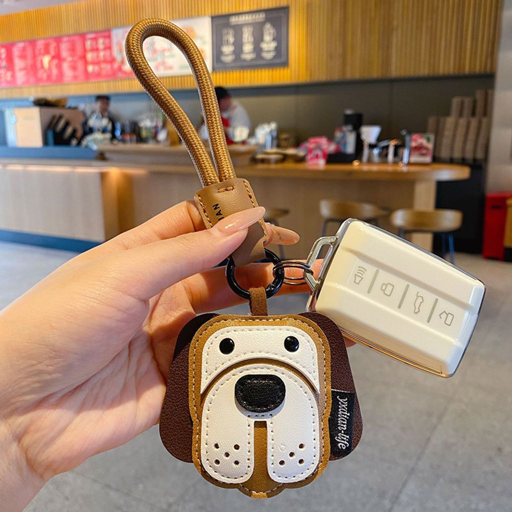 Beagle leather dog keychain charm attached to a car key fob