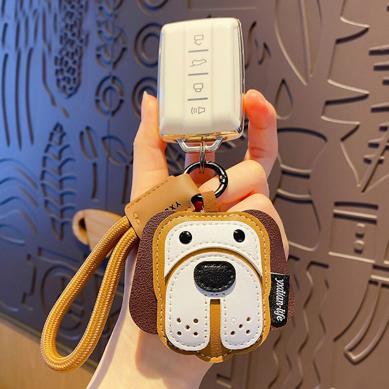 Beagle leather dog keychain charm attached to a car key fob