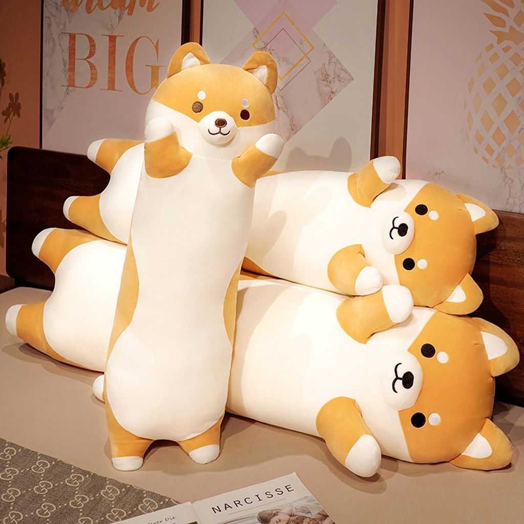 Shiba Inu long plush pillow on bed