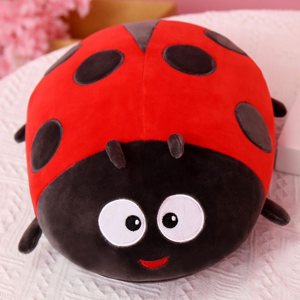 Red ladybug plush pillow