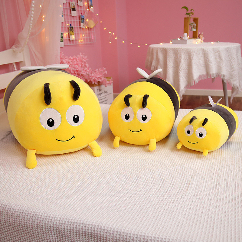 Bee and ladybug plush pillow shown in three sizes