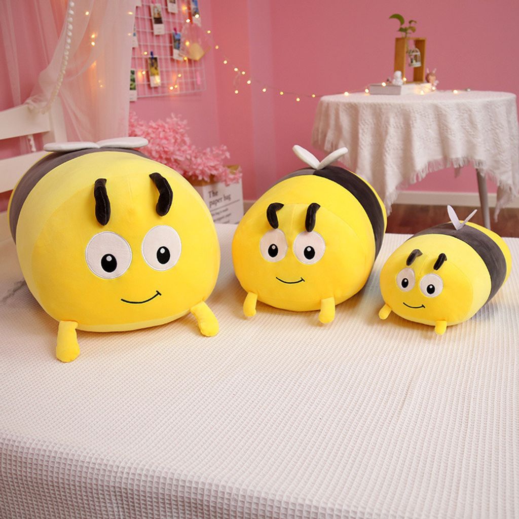 Bee and ladybug plush pillow shown in three sizes