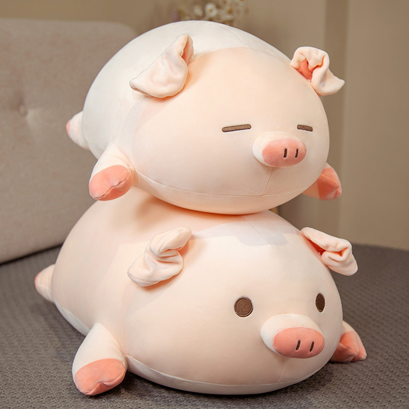 Cute bobo pig plush pillow on bed