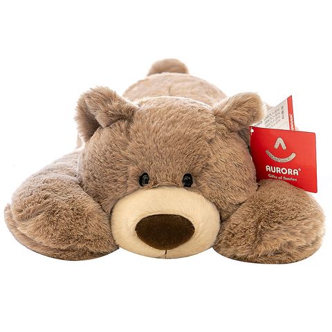 Brown bear lying plush toy on white background