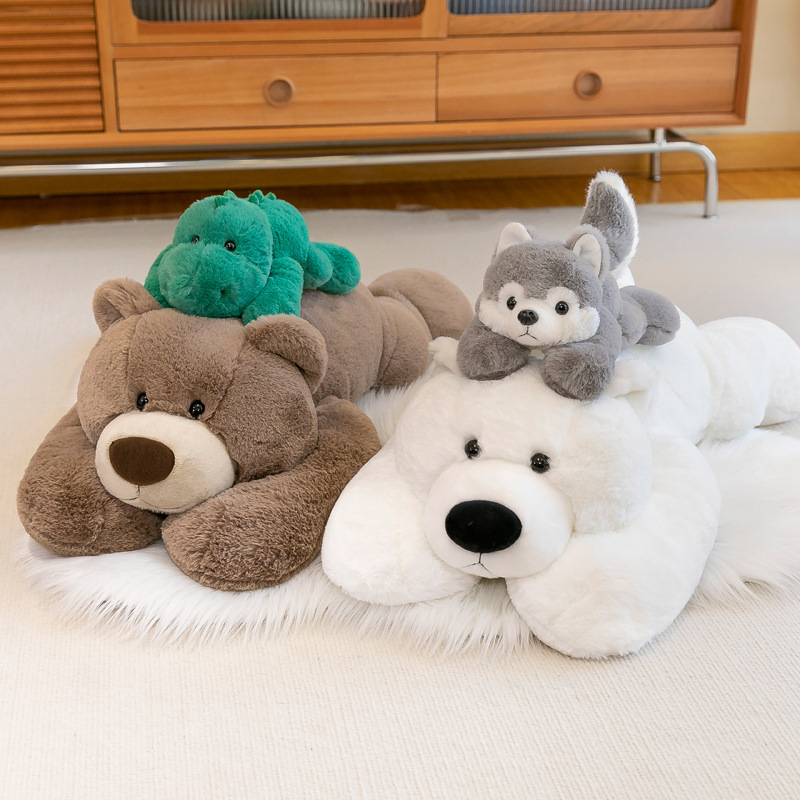 Lying plush toys stacked together showing size and softness