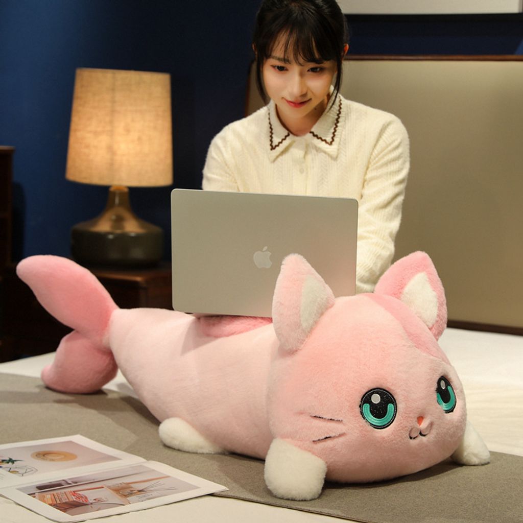 Cat fish plush pillow used for lounging and resting