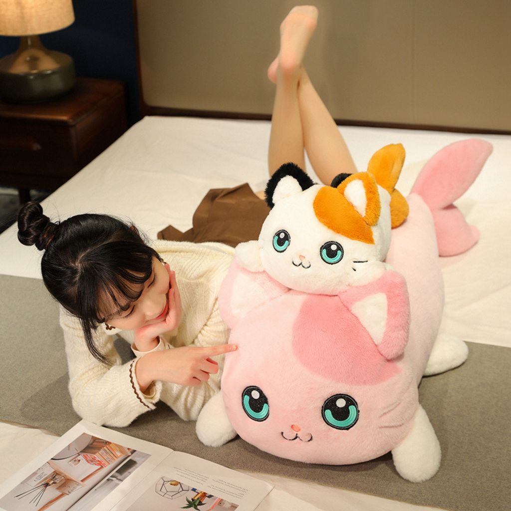 Cat fish plush pillow used for lounging and resting