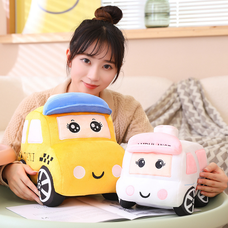 Cartoon car plush toy displayed in a cozy home setting