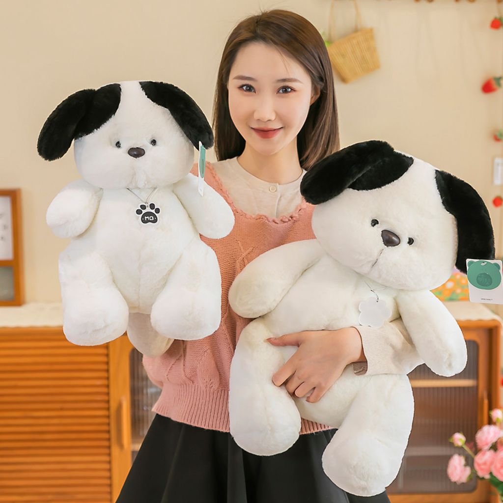 White dog plush toy shown in two sizes for size comparison