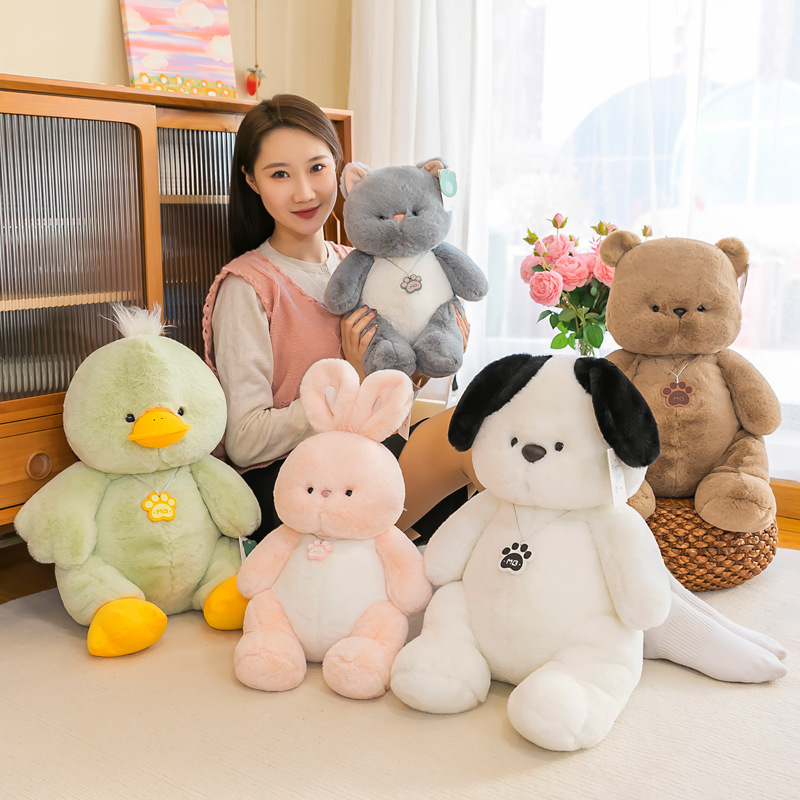 Soft animal plush toys displayed together in one set, featuring bear, cat, dog, rabbit, and duck
