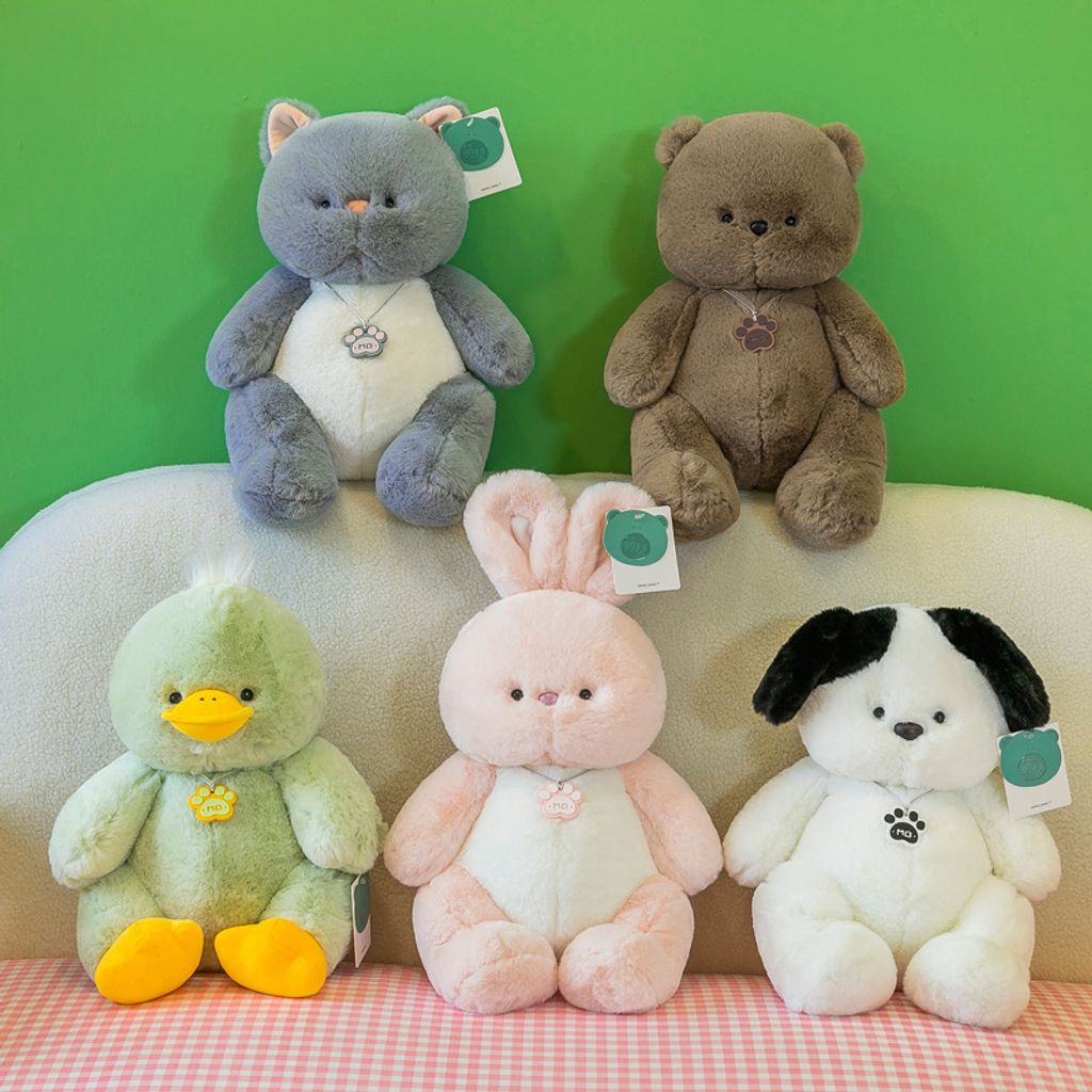 Bear cat dog rabbit and duck plush toys displayed together