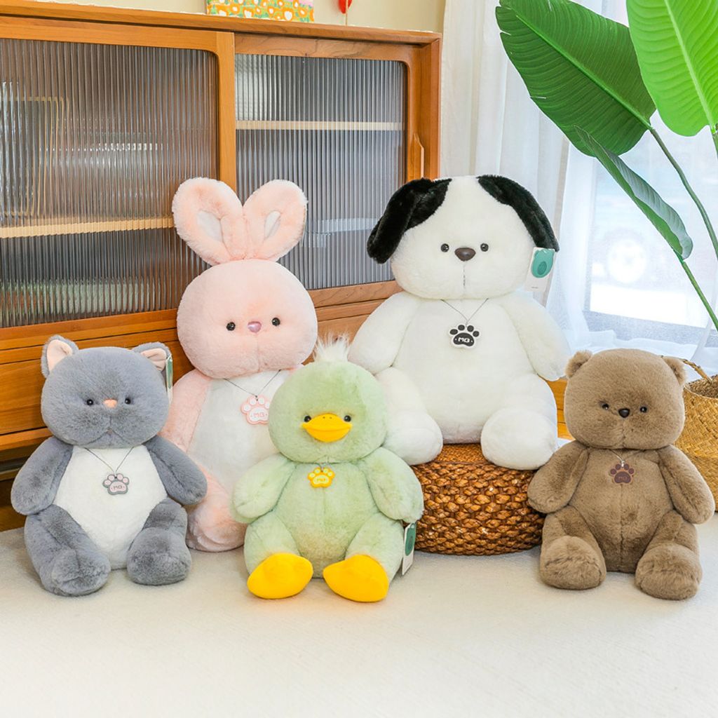 Bear cat dog rabbit and duck plush toys displayed together