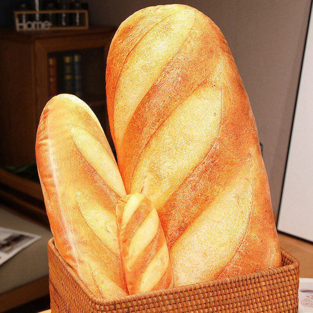 Realistic bread plush pillow shown in different sizes