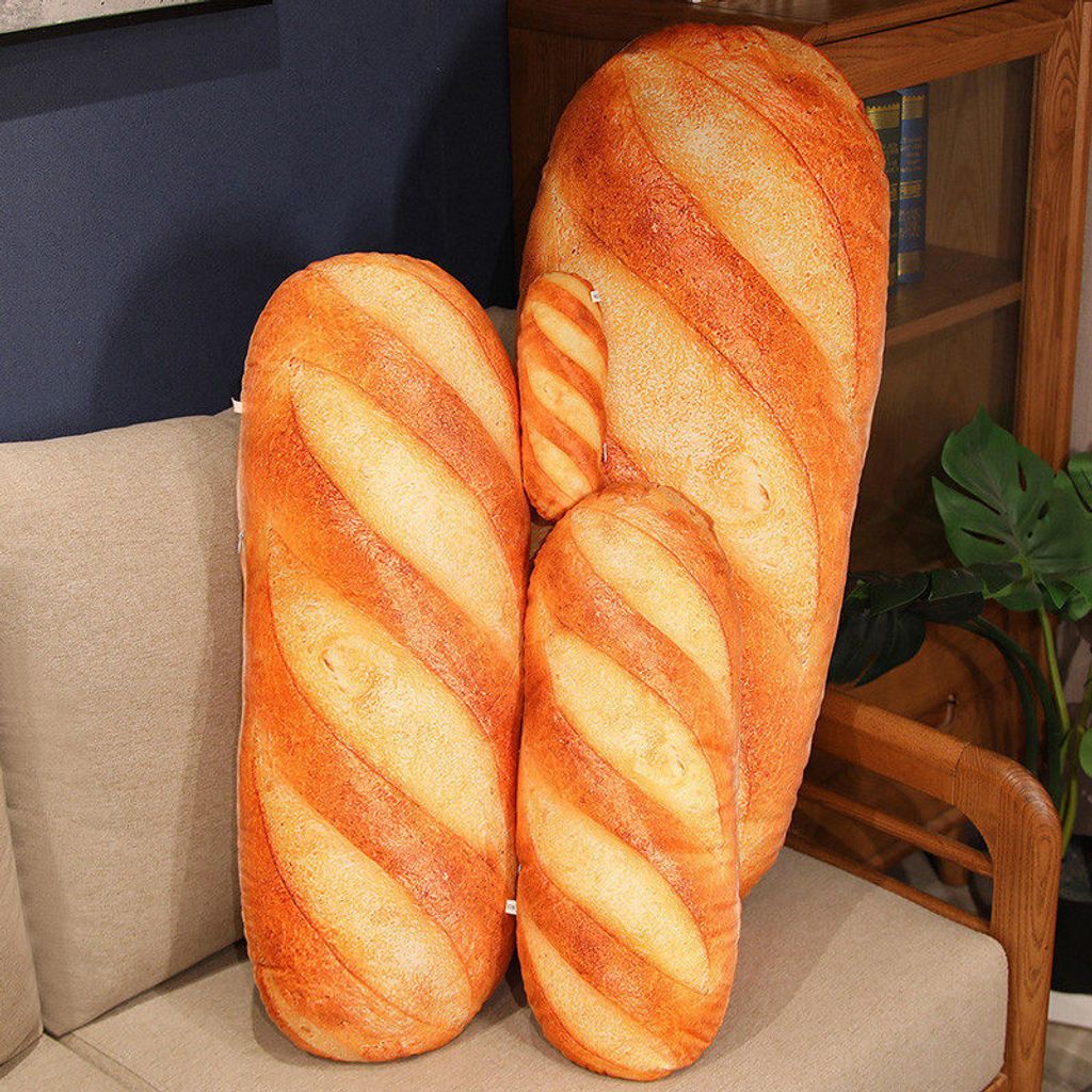Realistic bread plush pillow on sofa for home decor