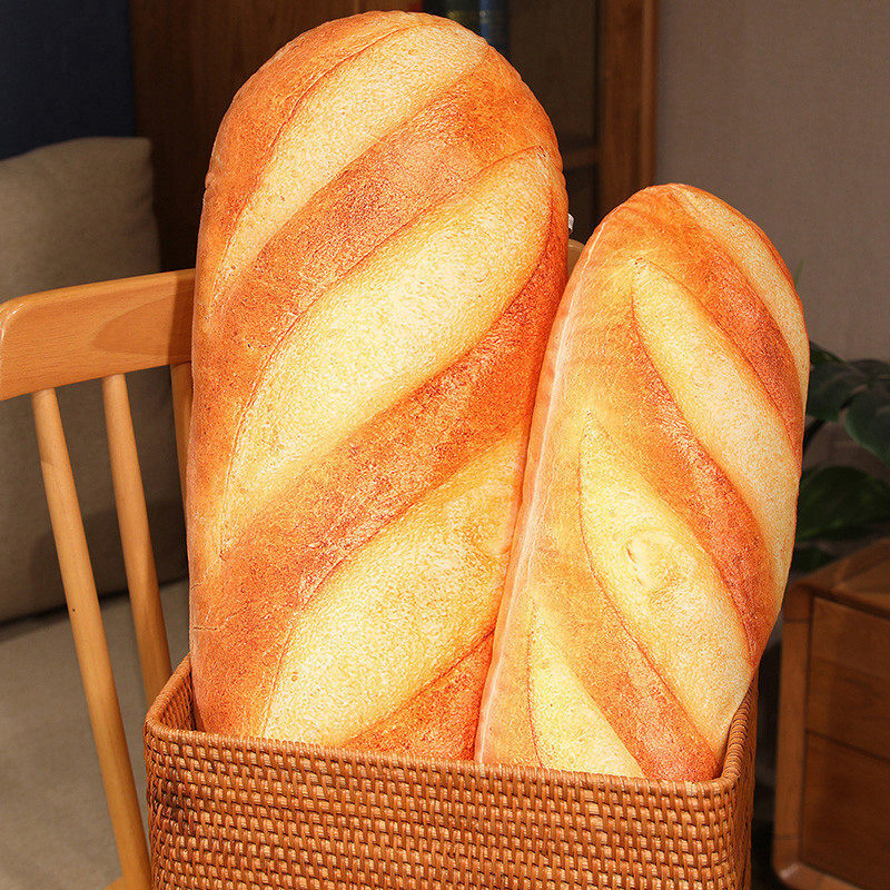 Realistic bread plush pillow standing upright for display