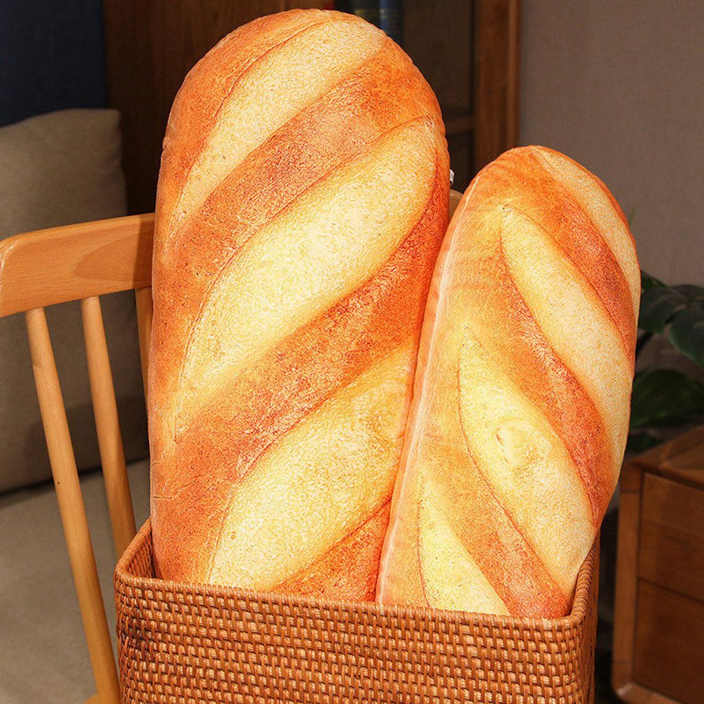 Realistic bread plush pillow standing upright for display