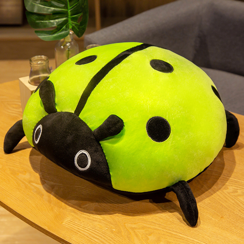 Green ladybug plush pillow