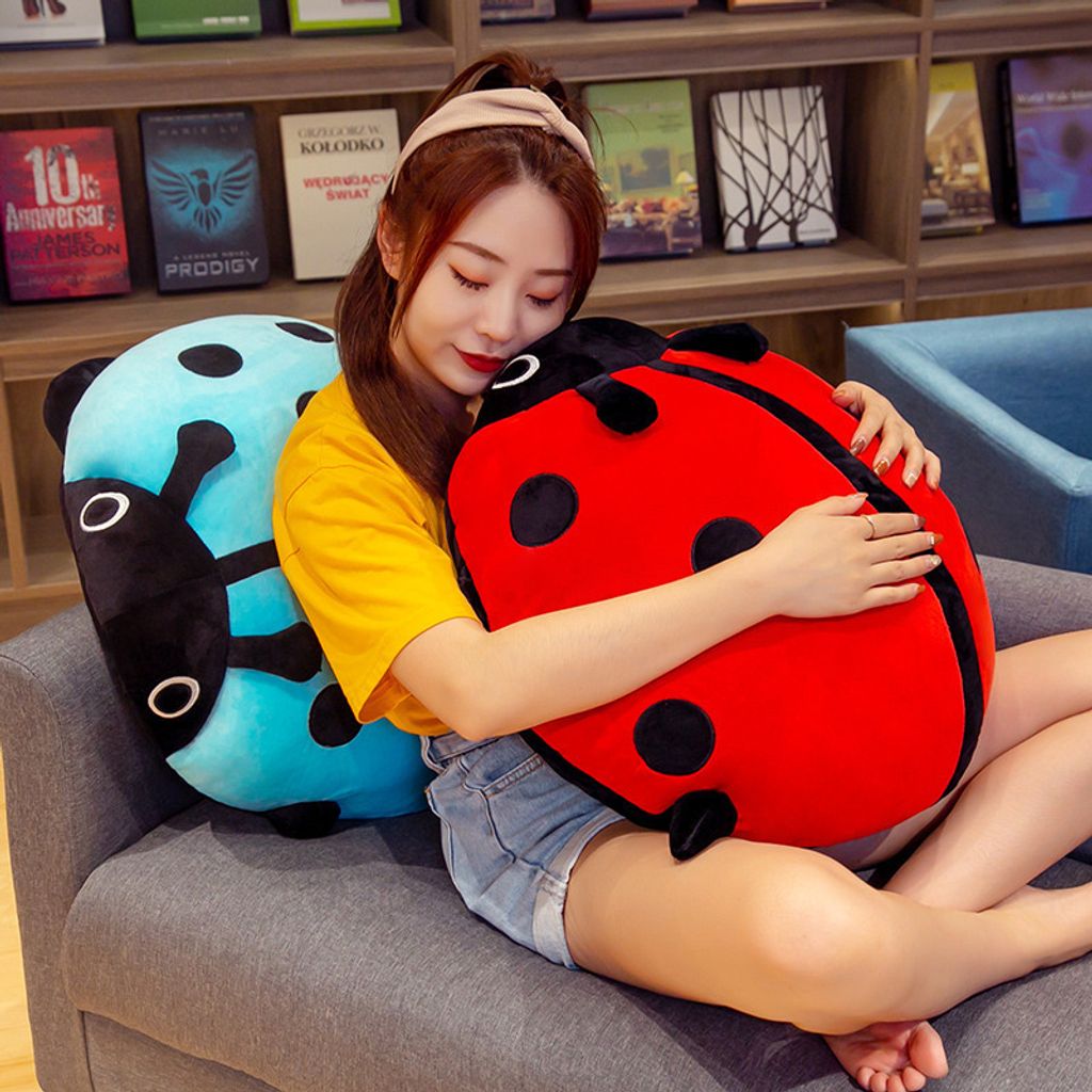 Cute ladybug plush pillow for hugging and lounging