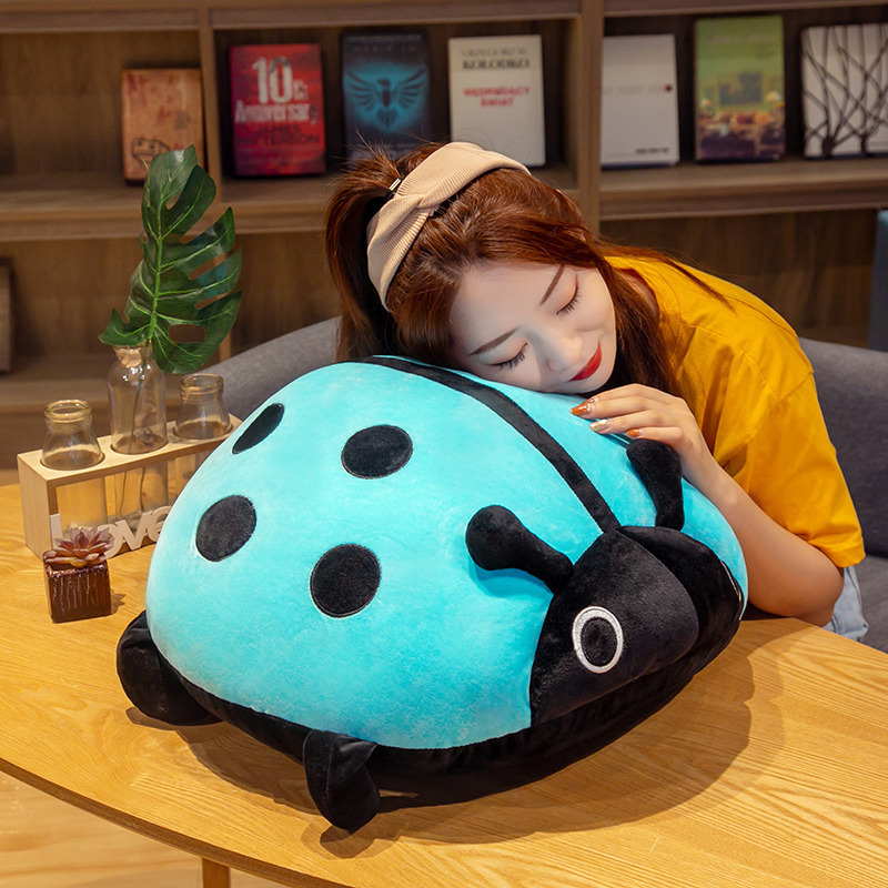 Cute ladybug plush pillow for hugging and relaxing