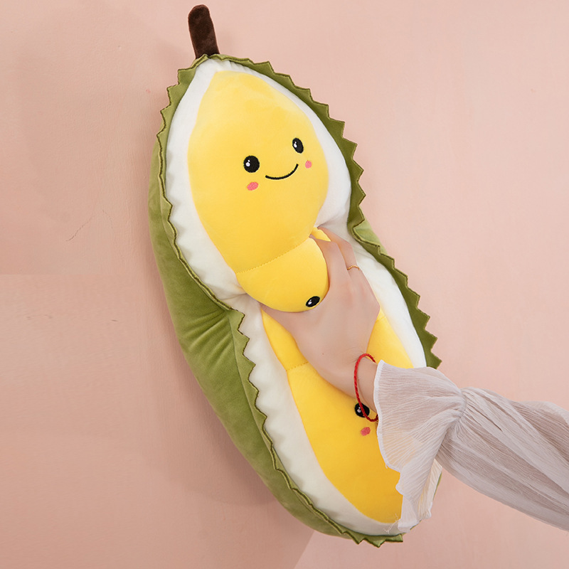 Cute durian plush pillow side view showing thickness and soft filling