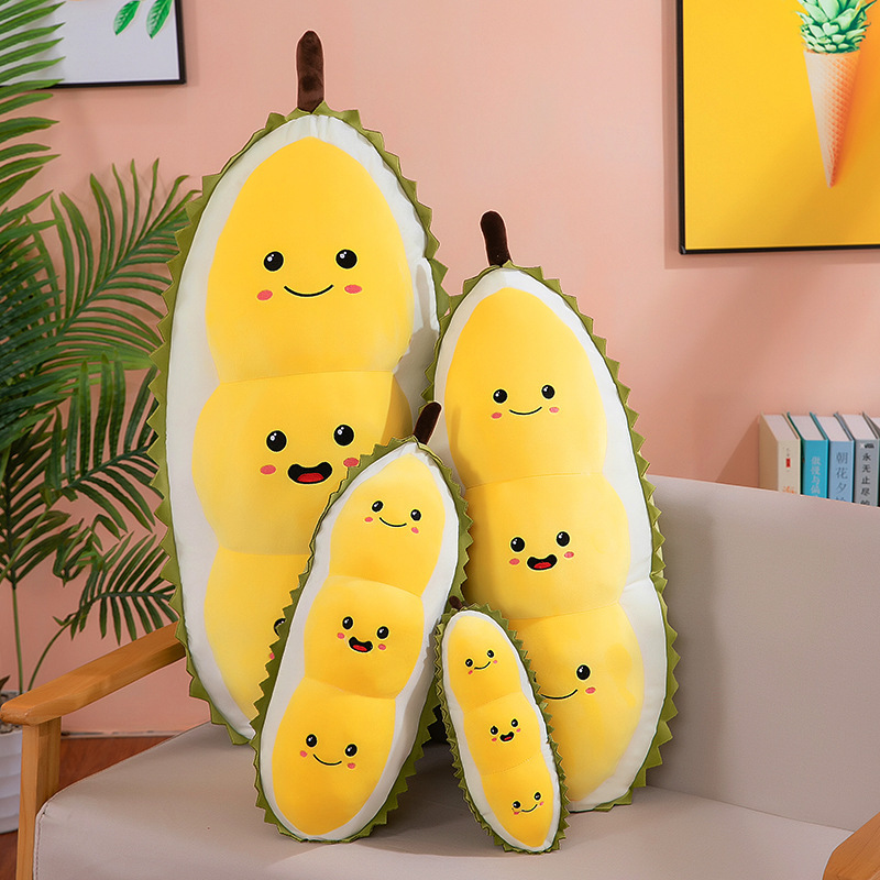 Cute durian plush pillows in different sizes displayed together