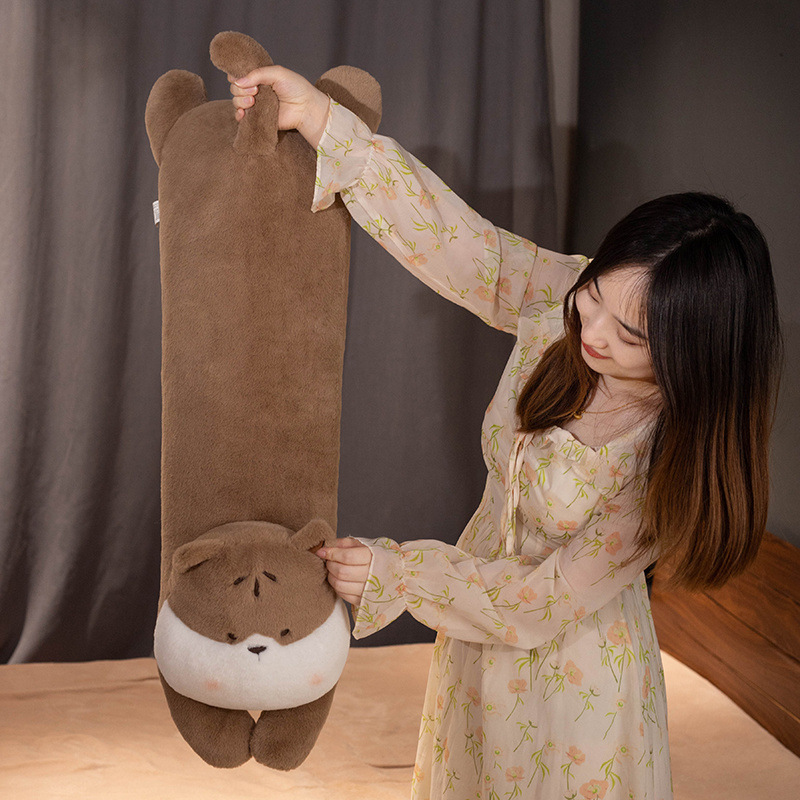 Long lying animal plush pillow showing full-length size and soft, flexible design for hugging