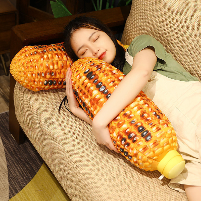 Roasted corn plush pillow used as a hugging body pillow