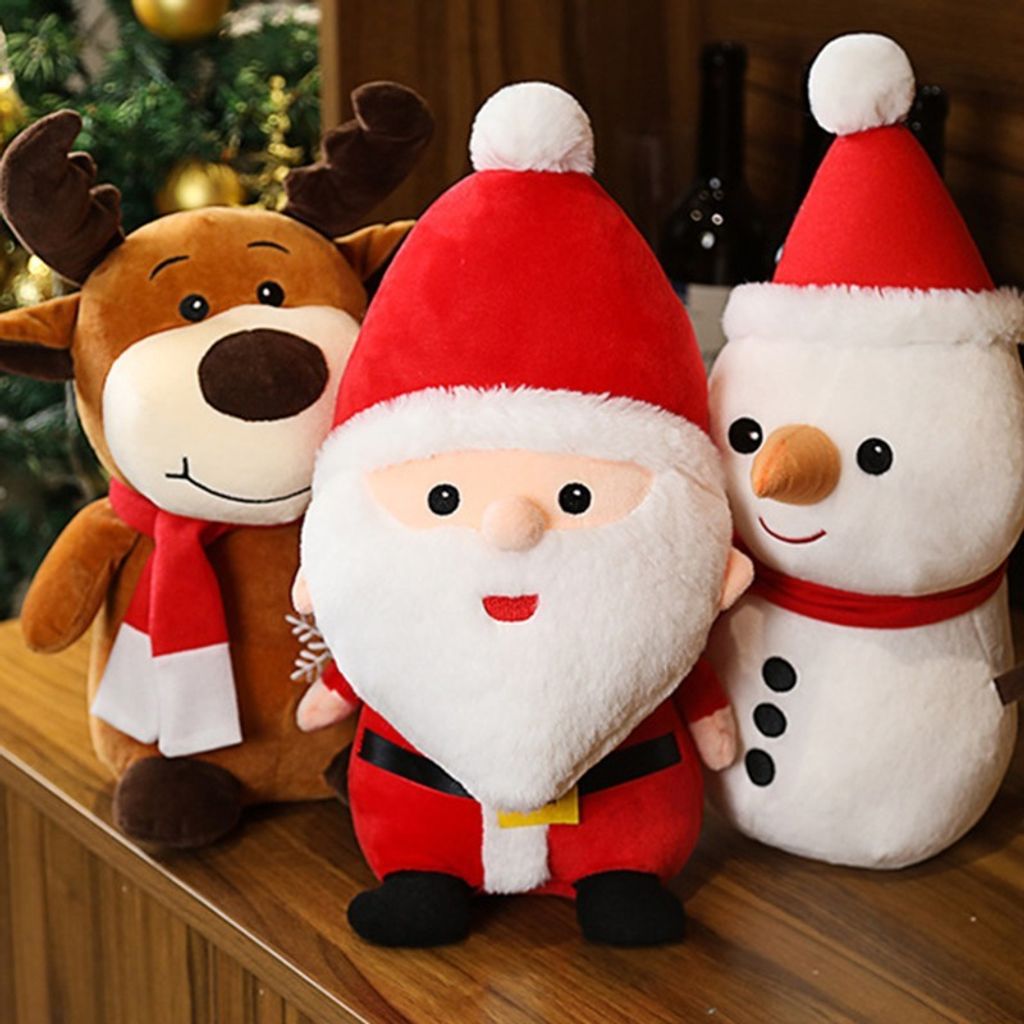 Cute Christmas plush toys featuring Santa Claus, Snowman, and Reindeer displayed together