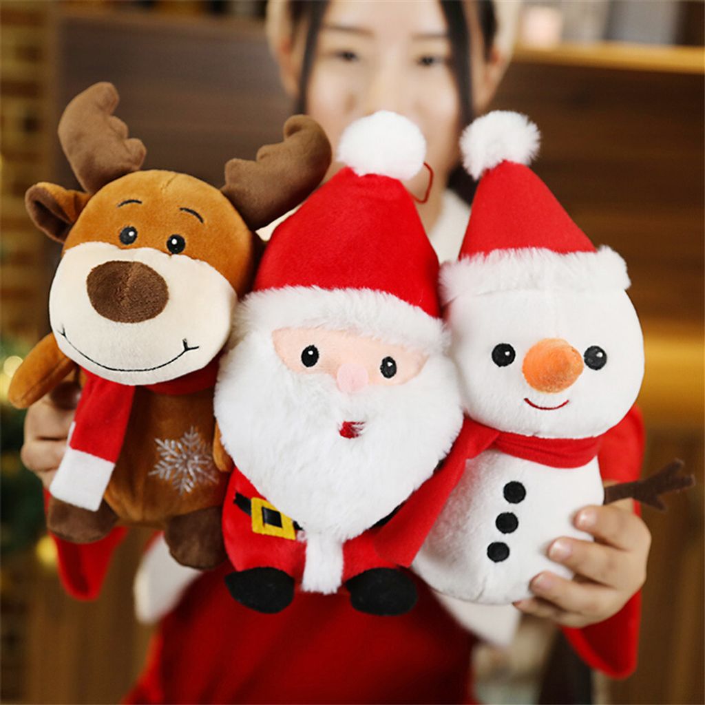 Cute Christmas plush toys featuring Santa Claus, Snowman, and Reindeer being held together